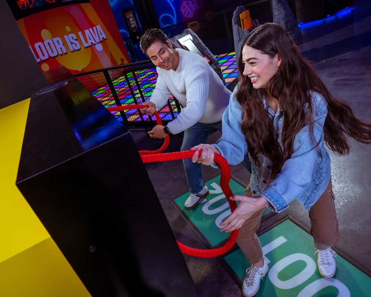 Couple playing in RePLAY arcade