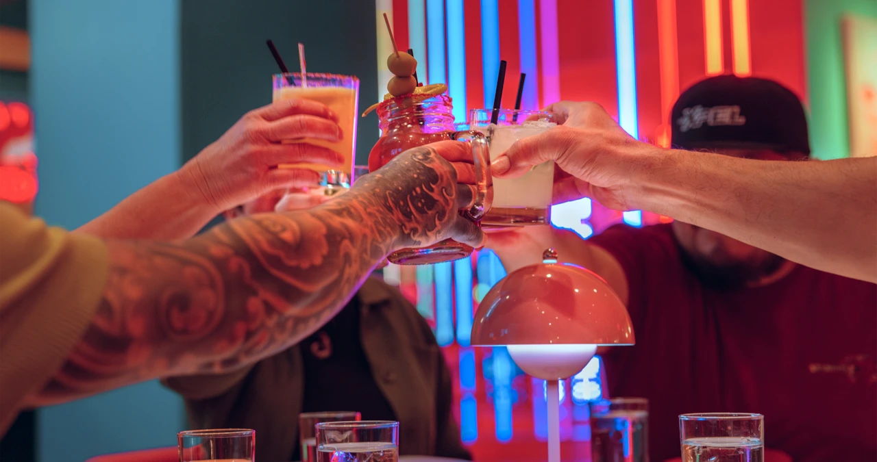 Friends cheering drinks